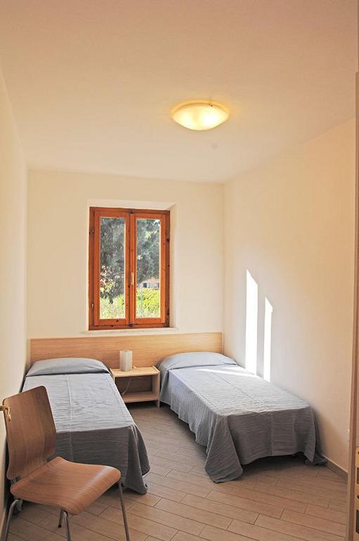 Appartamenti Casa Pineta مارينا دي كامبو الغرفة الصورة