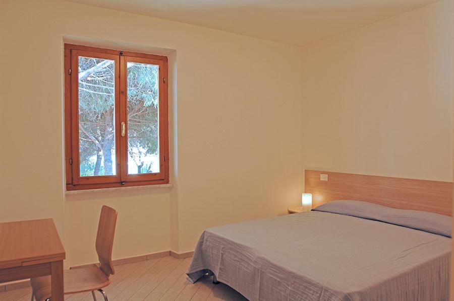 Appartamenti Casa Pineta مارينا دي كامبو الغرفة الصورة