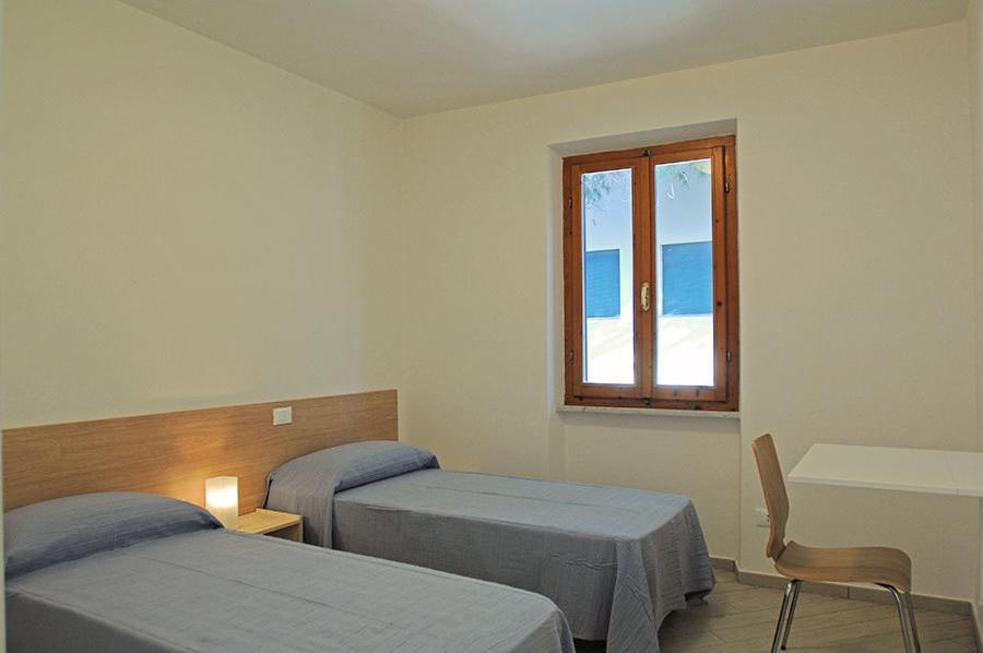 Appartamenti Casa Pineta مارينا دي كامبو الغرفة الصورة
