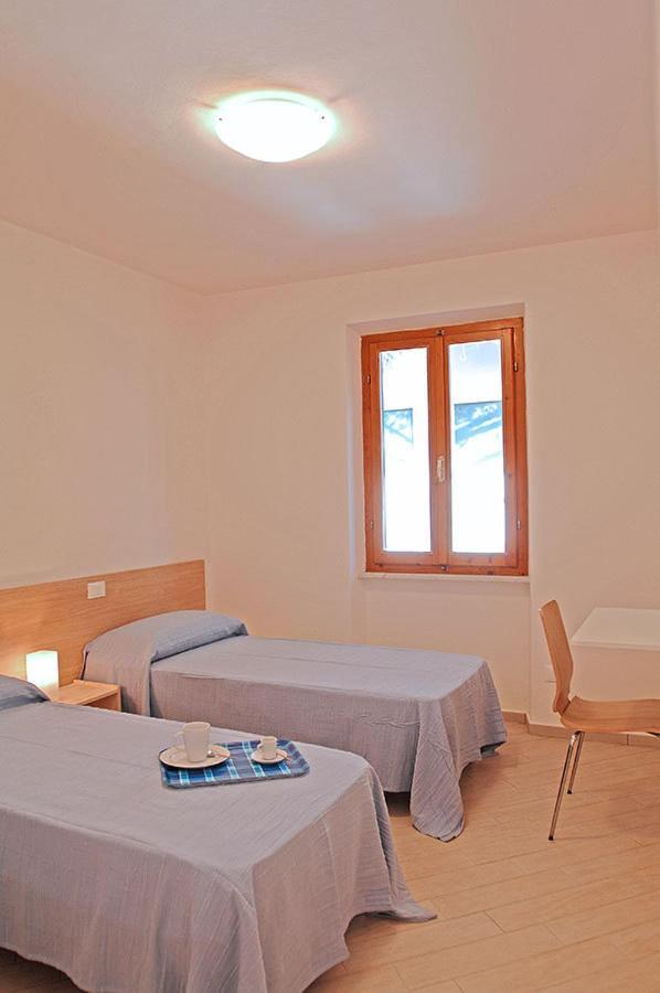 Appartamenti Casa Pineta مارينا دي كامبو الغرفة الصورة
